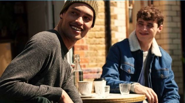 Outdoor Ease: Cameron Gentry & Adrien Sahores for H&M Left: All smiles, Cameron Gentry wears a H&M raglan-sleeved sweater and jeans. Right: Adrien Sahores wears a denim trucker jacket and joggers.
