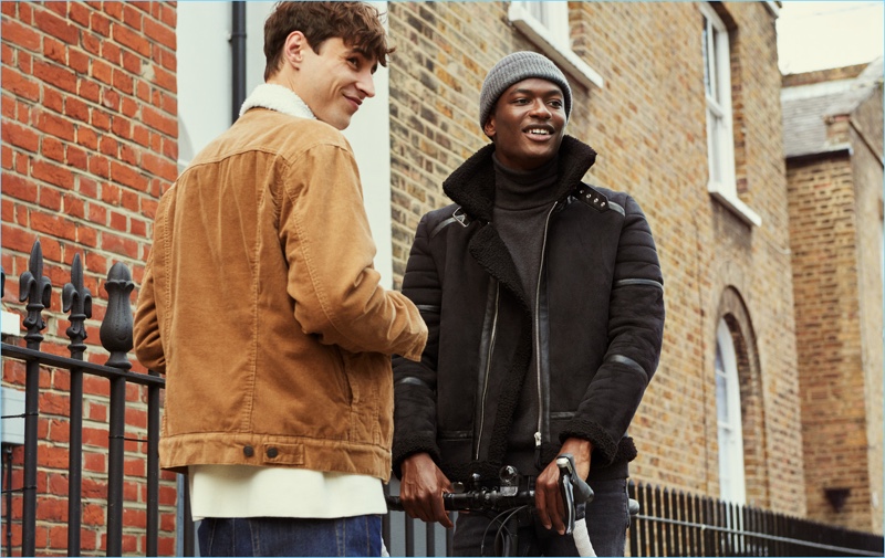 Pictured left, Adrien Sahores dons H&M's felted jacket. Meanwhile, Hamid Onifade wears the brand's biker jacket.