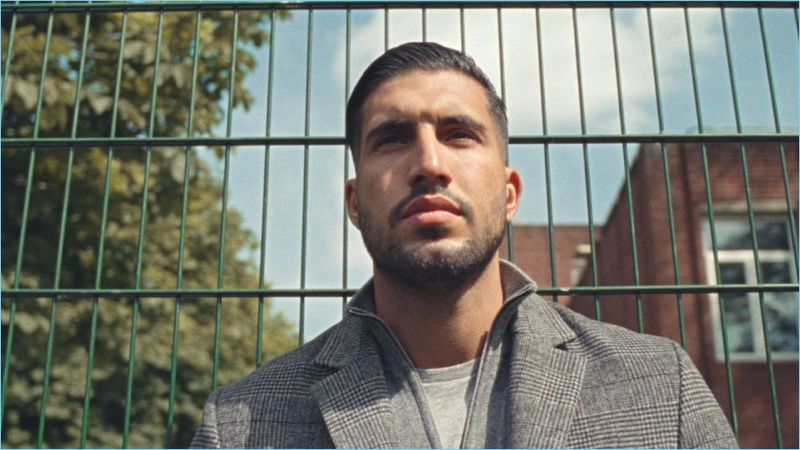 Emre Can wears a checked wool-blend coat from H&M.