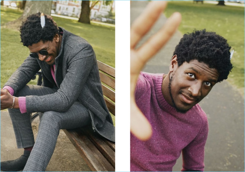 Labrinth, aka Timothy Lee McKenzie wears a fine-knit sweater and herringbone coat with standup collar.