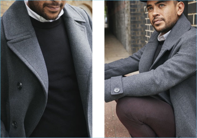 Gerardo Gonzalez dons a grey peacoat and fine-knit sweater by H&M.