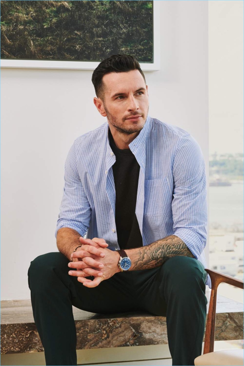 Connecting with Mr Porter, JJ Redick sports an A.P.C. grandad-collar shirt, Jaeger-LeCoultre watch, Acne Studios t-shirt, and Mr P. trousers.