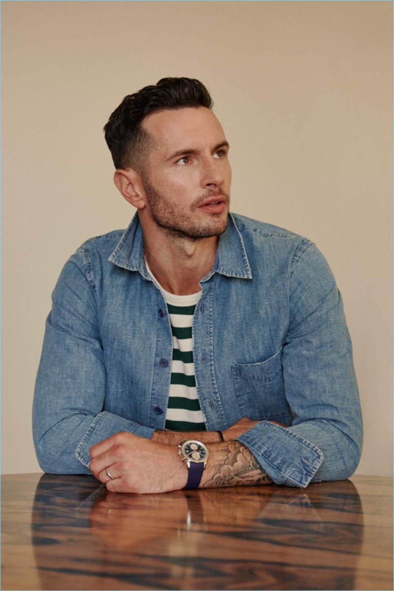 Front and center, JJ Redick wears an Aspesi denim shirt, Joseph t-shirt, and IWC Schaffhausen watch.