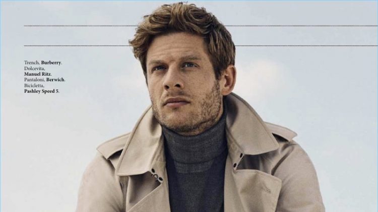 James Norton dons a Burberry trench with a Manuel Ritz turtleneck and Berwich trousers.