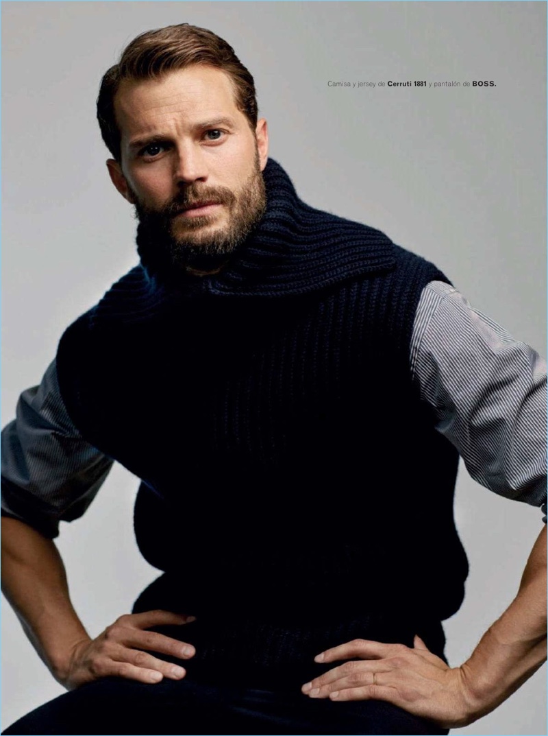 Starring in a new photo shoot, Jamie Dornan wears a Canali shirt and sweater vest with BOSS trousers.