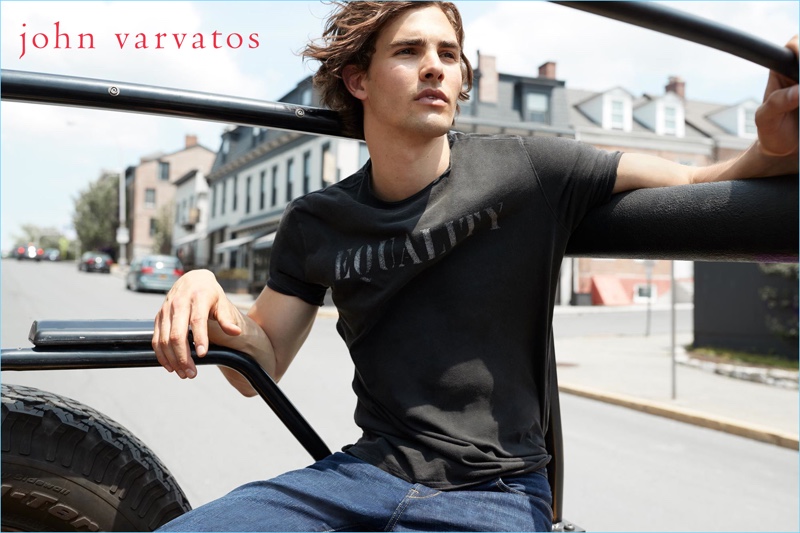 Gordon Winarick sports a t-shirt and jeans by John Varvatos Star USA.