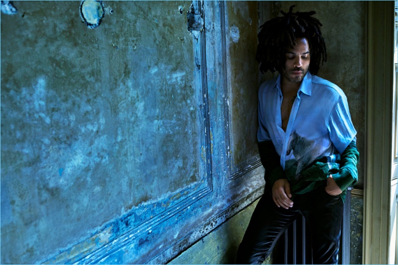 Posing for a moody image, Lenny Kravitz sports a Triple RRR shirt with his own trousers.