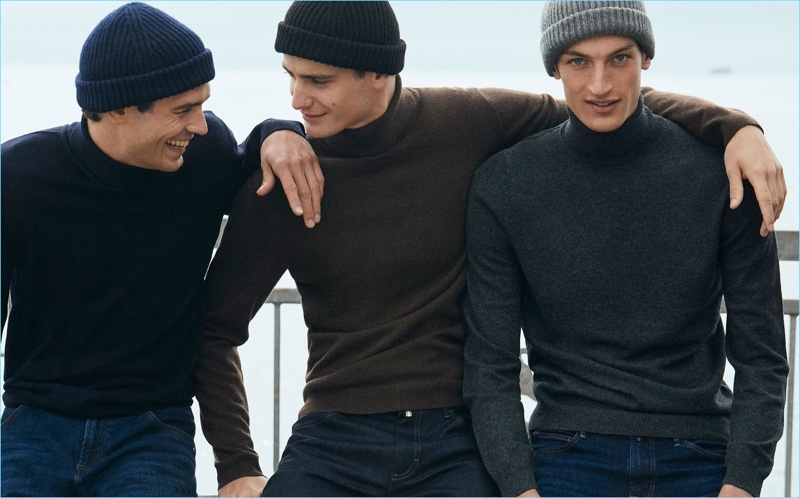 Models Arthur Gosse, Ben Allen, and Aaron Shandel don knit beanies and wool/cashmere turtleneck sweaters by Massimo Dutti.