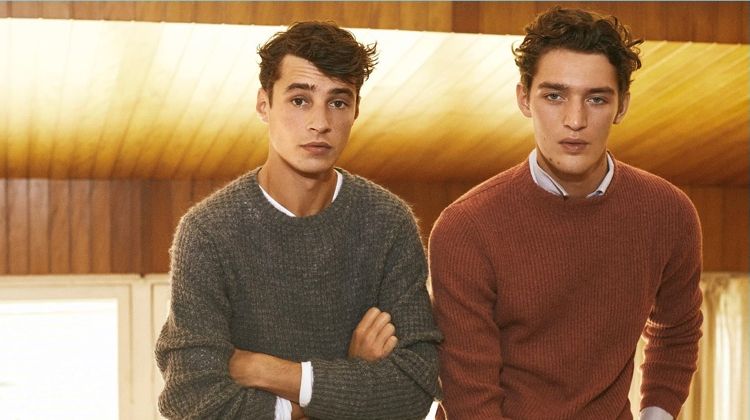 Models Adrien Sahores and Otto Lotz don sweaters from Massimo Dutti.