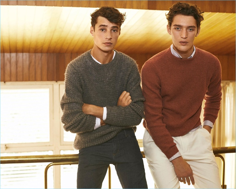 Models Adrien Sahores and Otto Lotz don sweaters from Massimo Dutti.