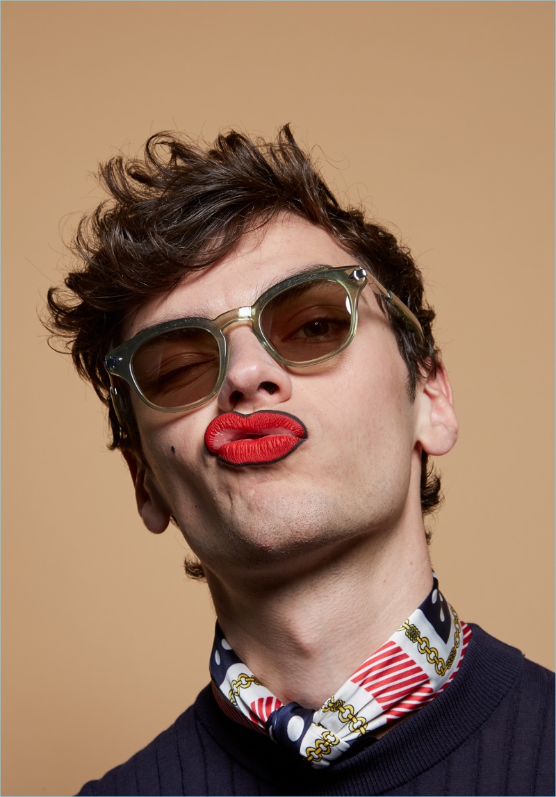 Making a silly face, Xander Weber wears Monumental by Karen Walker Klee Green sunglasses.