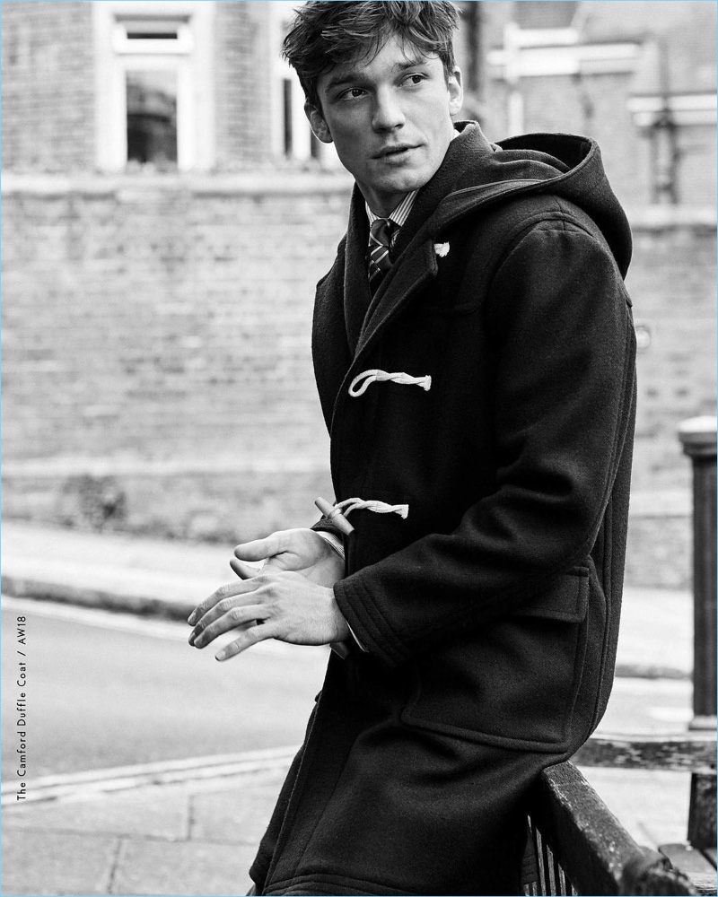 Alexis Petit dons a duffle coat for Morris Stockholm's fall-winter 2018 campaign.