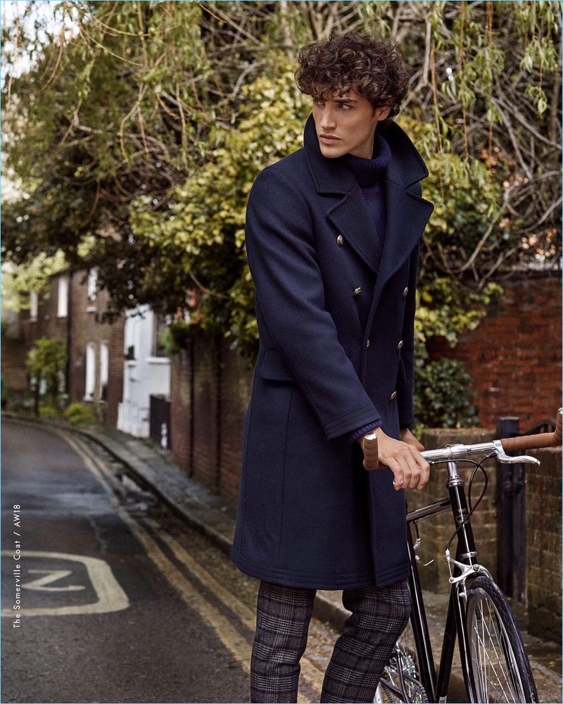 Donning a navy coat, Federico Novello fronts Morris Stockholm's fall-winter 2018 campaign.