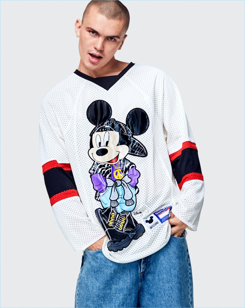 Louis Bubko wears a Mickey Mouse jersey from the Moschino [tv] H&M collection.