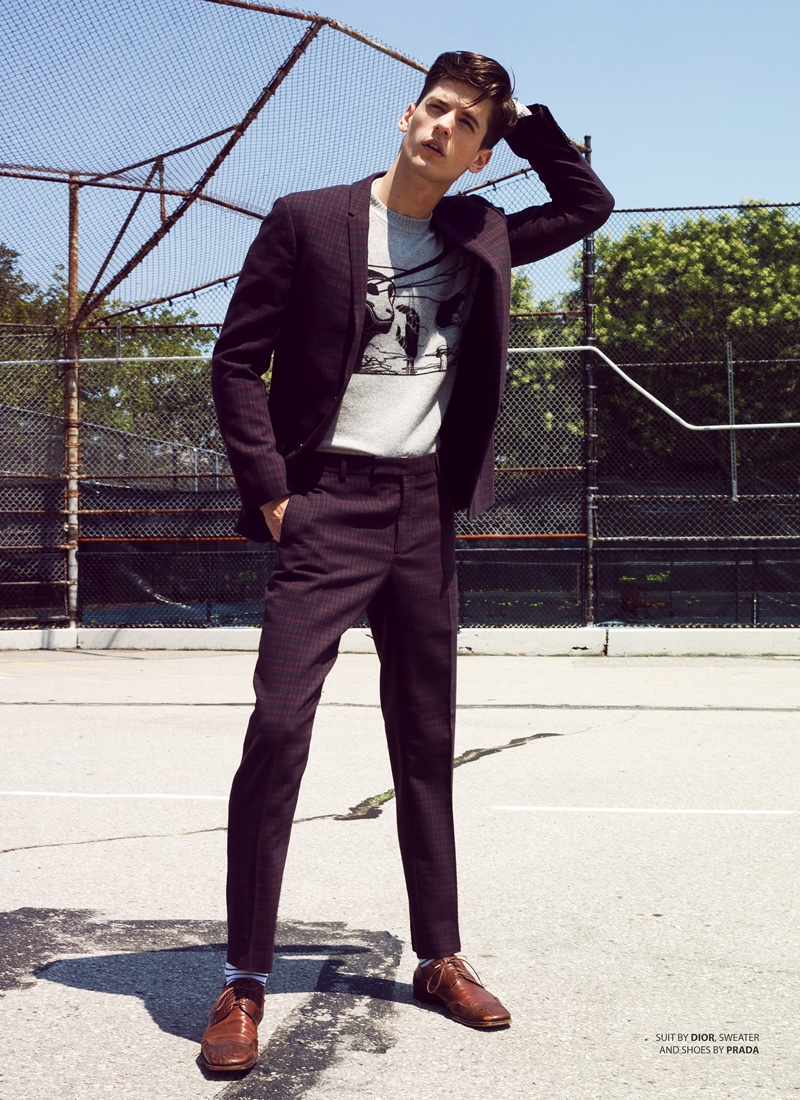 Nate wears suit Dior Men, sweater and shoes Prada.