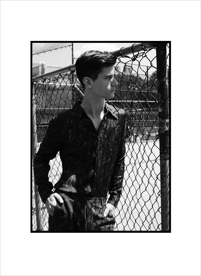 Nate wears shirt and pants Dries Van Noten.