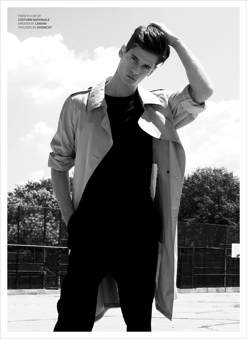 Nate wears trench Costume National, sweater Lanvin, and trousers Givenchy.