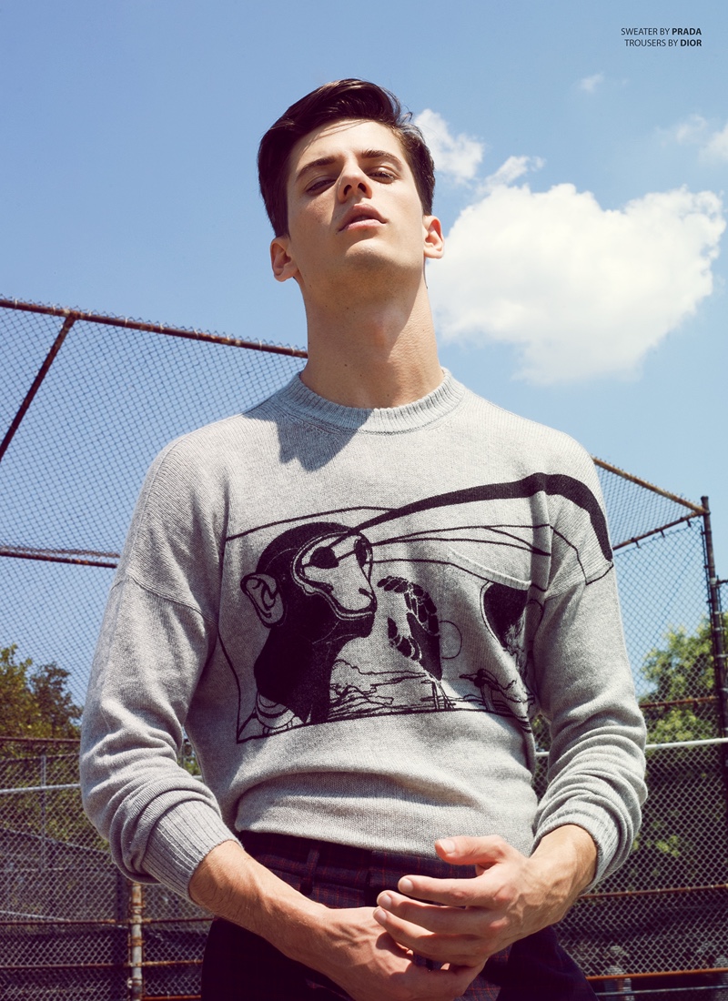 Nate wears sweater Prada and trousers Dior Men.