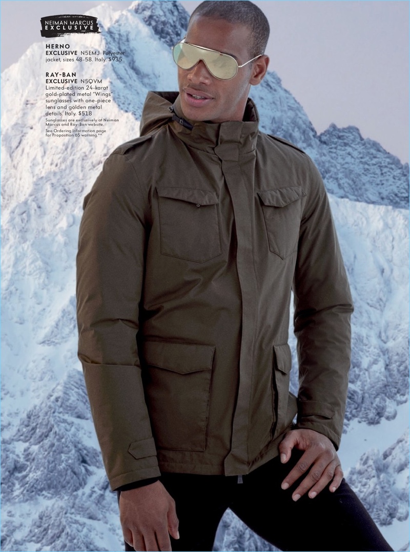 Ready for winter, Sacha M'Baye wears a Herno jacket and Ray-Ban sunglasses.