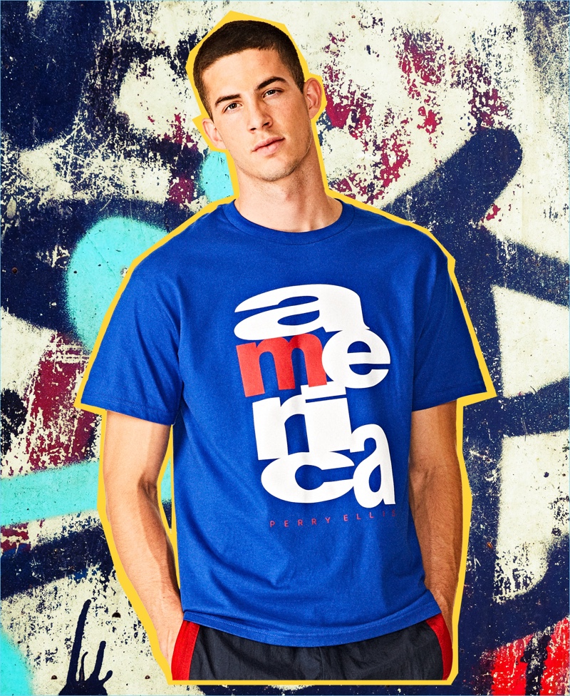 Model Keegan Rodriguez wears a graphic blue t-shirt from the Perry Ellis America capsule collection.