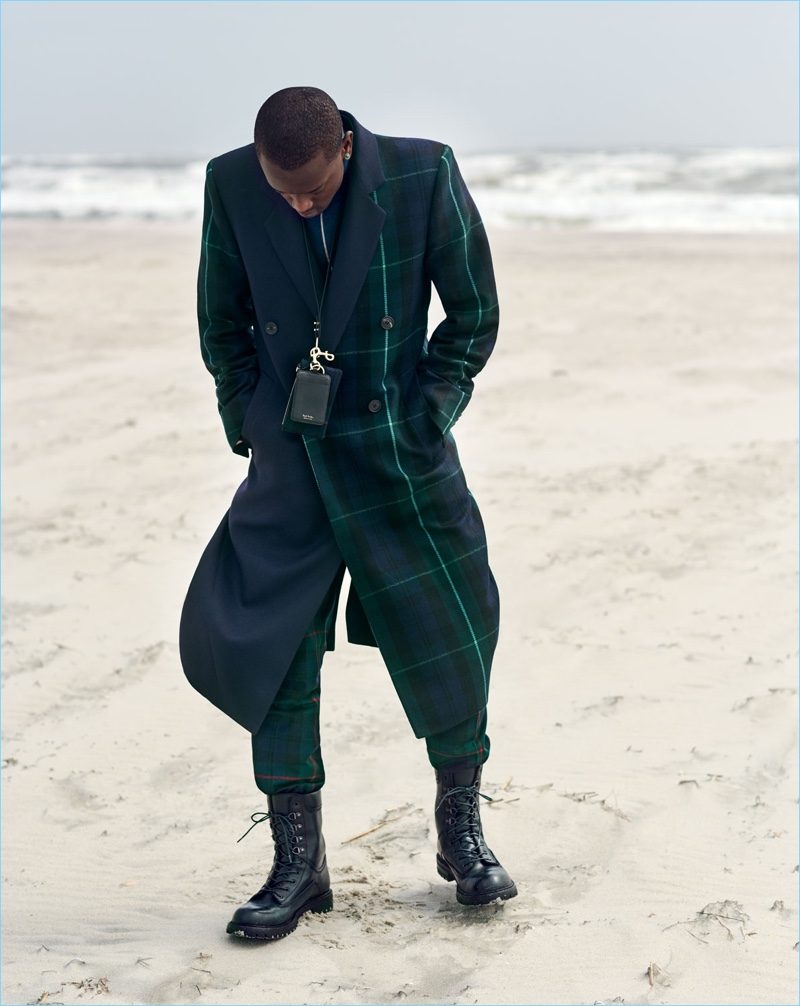 Sporting green and navy tartan, Buddy wears Paul Smith.