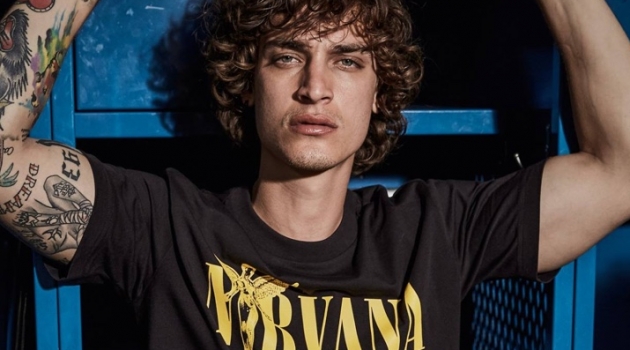 Brazilian model Jonathan Bellini rocks a Nirvana t-shirt from Replay's new collection.