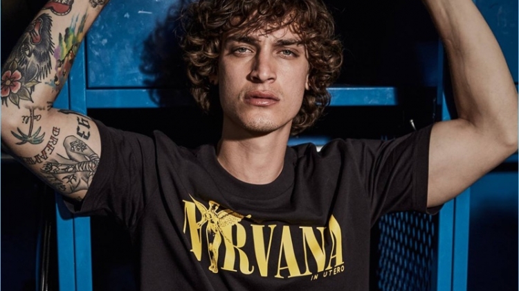 Brazilian model Jonathan Bellini rocks a Nirvana t-shirt from Replay's new collection.