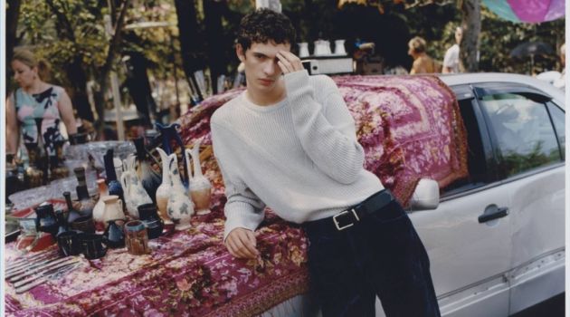 Piero Méndez Explores Poland in Reserved Re.Design.03 Collection A chic vision, Piero Méndez wears velour denim jeans and ankle-high boots from Reserved's Re.Design.03 collection.