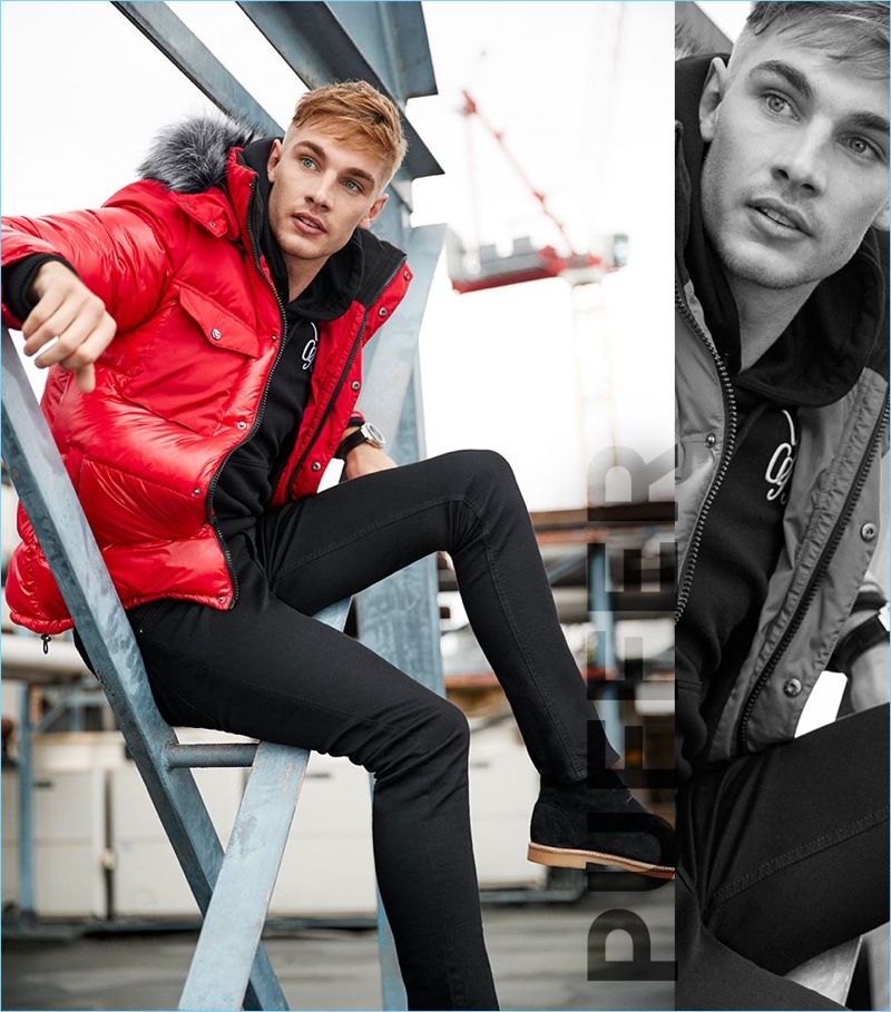 Parka: Tommy Marr sports a red faux fur trim hooded long puffer jacket by River Island.