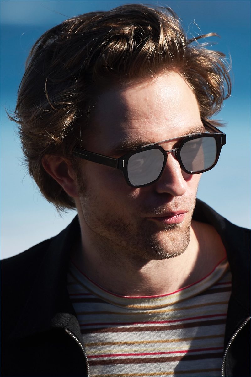 Robert Pattinson sports Dior Men's DiorFraction1 sunglasses.