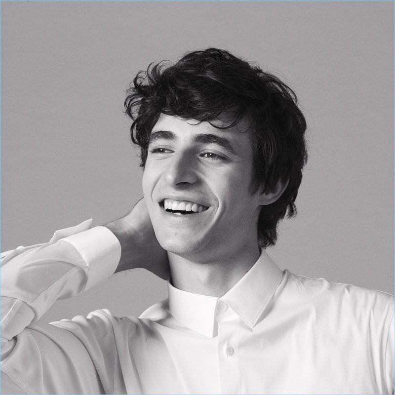 All smiles, Oscar Kindelan wears a slim-fit classic shirt from Sandro.
