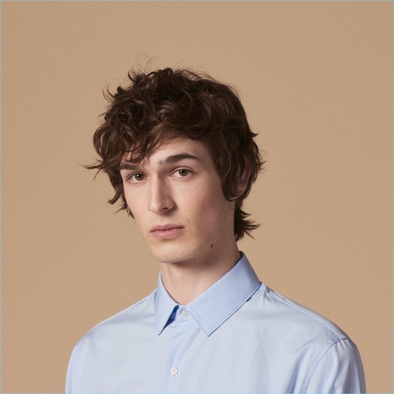 Dylan Fender wears a slim-fit shirt in stretch cotton by Sandro.