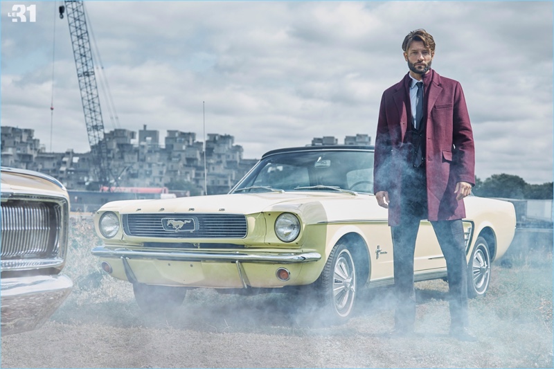 A sharp vision, John Halls models a LE 31 felt peacoat, burgundy check suit, dress shirt, and tie with Simons brogues.