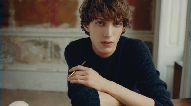 Xavier Buestel is Chic for Smythson Fall '18 Campaign Sitting for a photo, Xavier Buestel poses with Smythson's leather-bound notebooks.