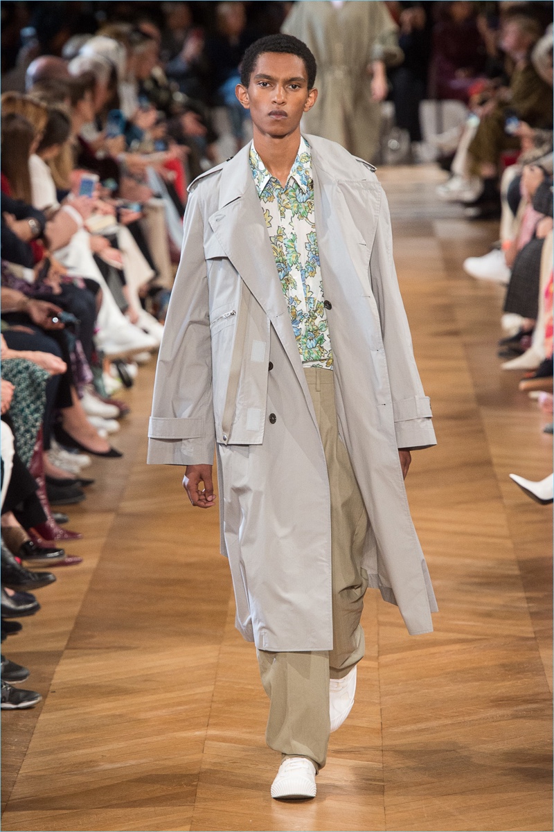 Matthew Petersen sports an oversized trench from Stella McCartney's spring-summer 2019 men's collection.