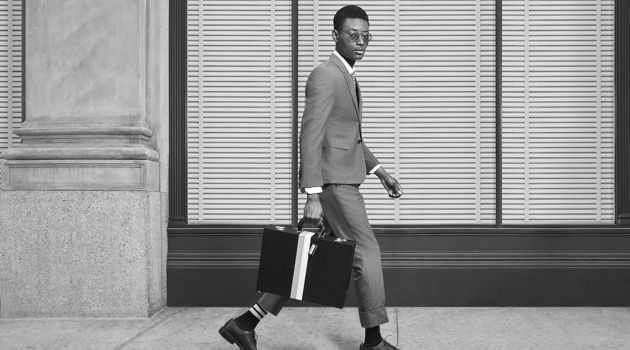 Youssouf Bamba Dons Thom Browne's Sharp Fall '18 Uniform John Juniper photographs Youssouf Bamba for Thom Browne.