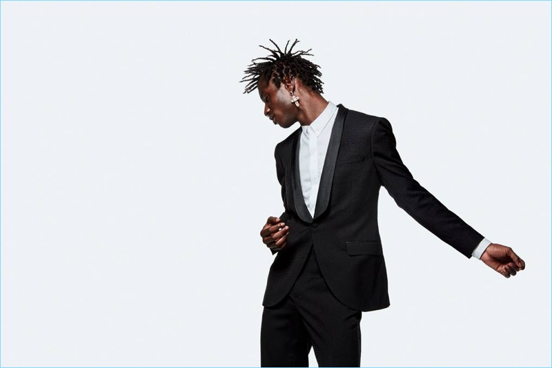 A sleek vision, Adonis Bosso suits up for Topman's fall-winter 2018 campaign.