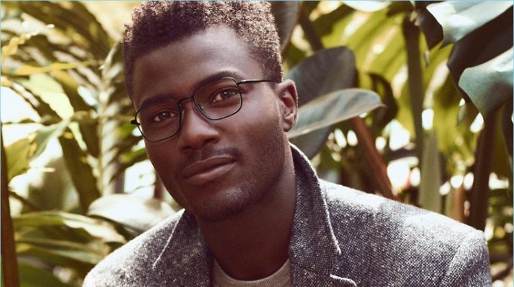 Remi Alade-Chester dons Warby Parker's Stanley glasses in brushed ink.