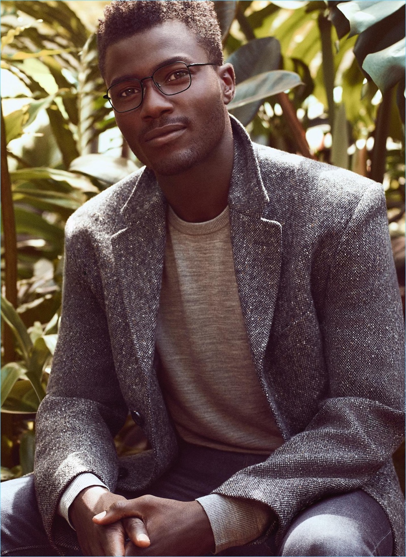 Remi Alade-Chester dons Warby Parker's Stanley glasses in brushed ink.