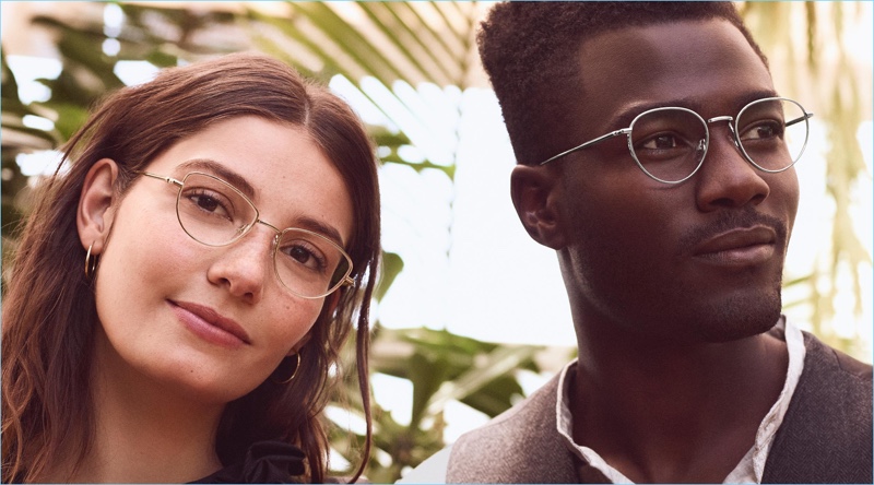Model Remi Alade-Chester sports Warby Parker's Ezra glasses in burnished silver.