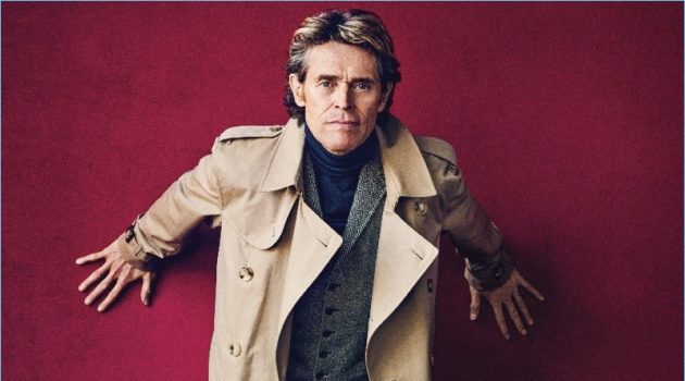 Willem Dafoe Dons Fall Style for Esquire The Big Black Book Front and center, Willem Dafoe wears a Burberry trench, POLO Ralph Lauren vest, Hermès turtleneck sweater, and Ralph Lauren trousers. Church's shoes complete Dafoe's look.