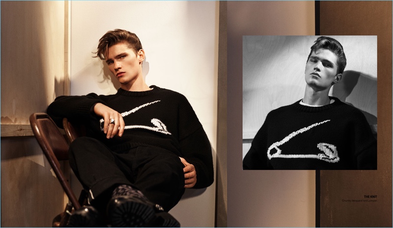 Reuniting with Zara, Lukas Marschall wears a sweater with a giant safety pin graphic.