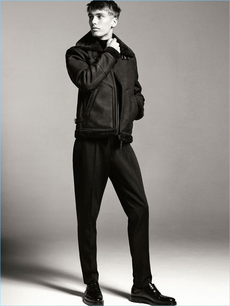 Marc Schulze models a shearling jacket by Zara Man.