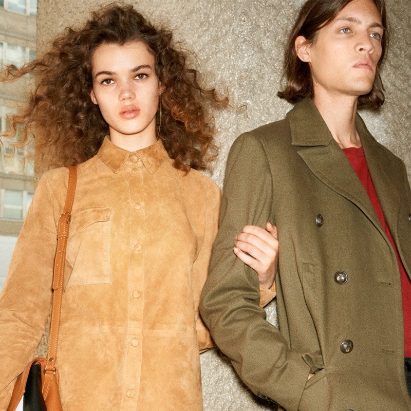 Models Hannah Sprehe and Marcel Castenmiller wear looks from 8 by YOOX. Marcel sports a military green coat from the range.