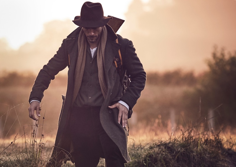 Alban wears hat Stetson, coat Tailorable, shirt Brunello Cucinelli, pants AMI, and vintage scarf.