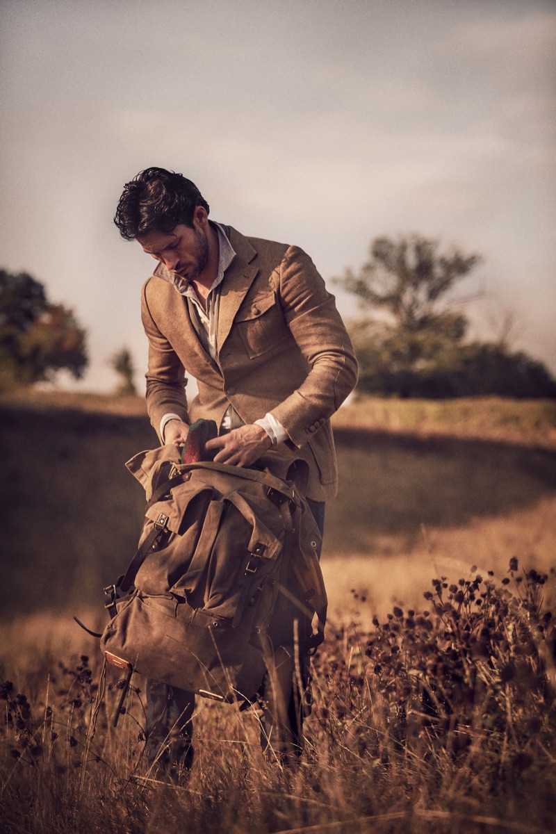 Alban wears jacket Tailorable, pants AMI, shirt Massimo Dutti, and bag Frost River.