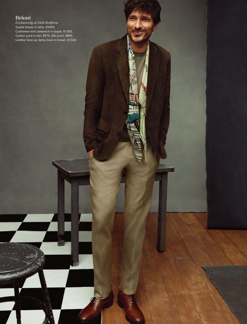 A smart vision, Andres Velencoso wears a Brioni suede blazer, cashmere sweater, tan pants, and leather shoes.