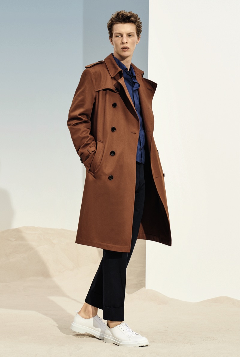 Donning a brown trench coat, Tim Schuhmacher appears in BOSS' spring-summer 2019 lookbook.