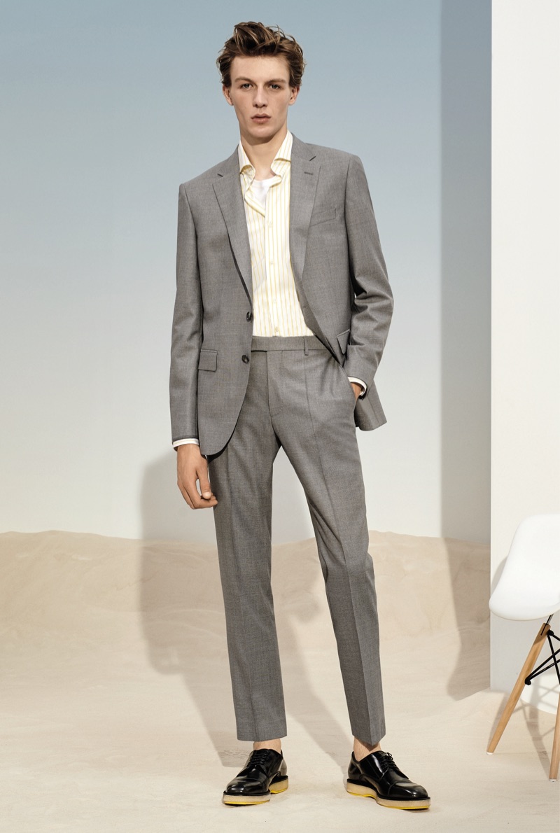 Donning a grey suit, Finnlay Davis is a chic vision in BOSS.
