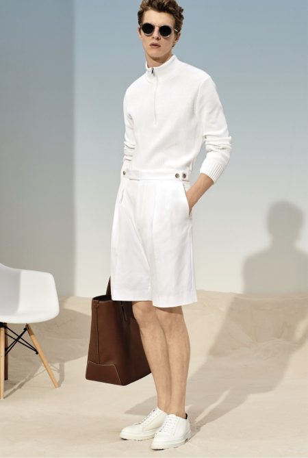 Ready for summer, Tim Schuhmacher wears a white look from BOSS.